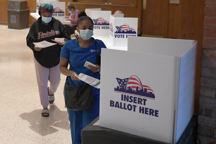 Voters cast their ballots in Missouri's primary election on August 4, 2020 at Gambrinus Hall in St Louis, Missouri. In November, voters will decide on Amendment 3 which would change the state's approach to redistricting.
