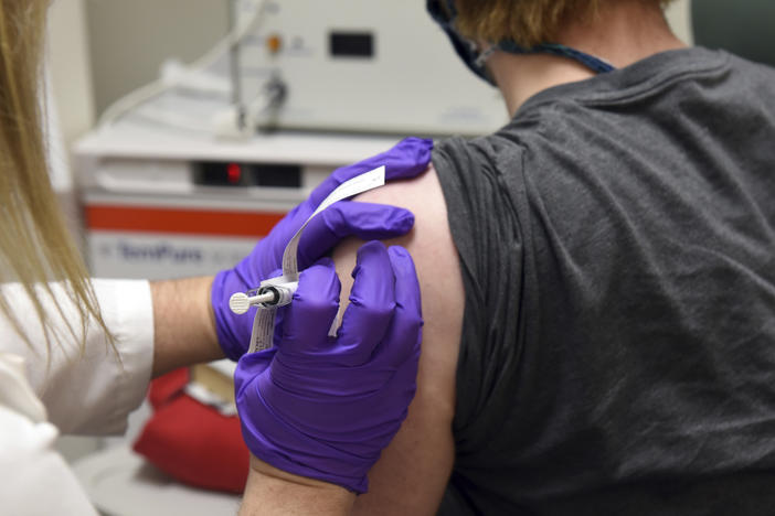 The first patient enrolled in Pfizer's COVID-19 vaccine clinical trial at the University of Maryland School of Medicine in Baltimore receives an injection in May.