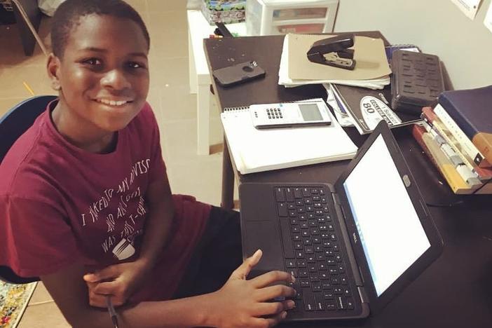 Caleb Anderson, 12, attends virtual calculus class this month at Chattahoochee Technical College in Marietta, Ga., where he is a sophomore.