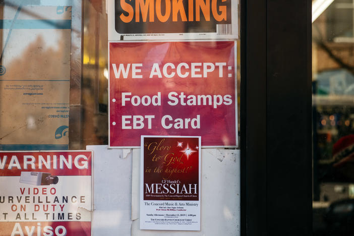A judge has tossed out a U.S. Department of Agriculture rule that would have limited food stamps, noting that during the pandemic "SNAP rosters have grown by over 17 percent with over 6 million new enrollees." Here, a sign alerts customers about food stamps at a store in New York City.
