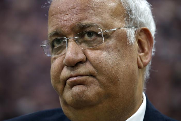 Saeb Erekat, Secretary-General of the Palestine Liberation Organisation and chief Palestinian negotiator, talks to reporters in the West Bank city of Ramallah in March. Erekat is being treated in a Jerusalem hospital after contracting COVID-19.