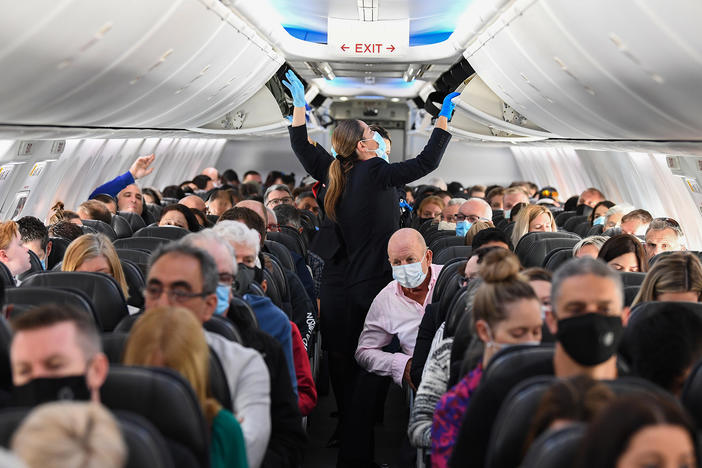 There's increasing emphasis on wearing masks while flying. How much protection do they offer against COVID-19?