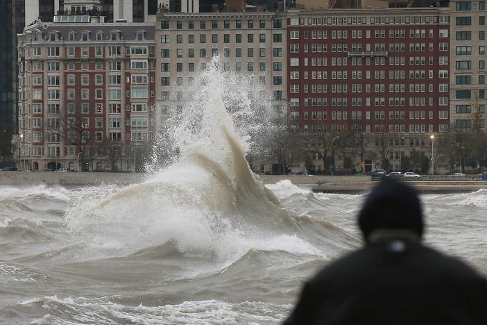 The remnants of Hurricane Sandy churn up Lake Michigan in Chicago in 2012. Flood risk in the city is increasing as climate change drives more extreme rain, and renters face greater financial peril than homeowners. More than half of Chicagoans are renters, according to 2019 census data.