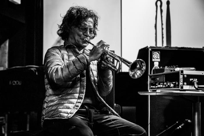Esteemed jazz musician Toshinori Kondo playing the trumpet.