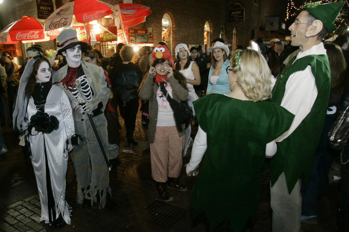 Goblins mix with elves in less scary times, celebrating Halloween in Salem, Mass., in 2007.