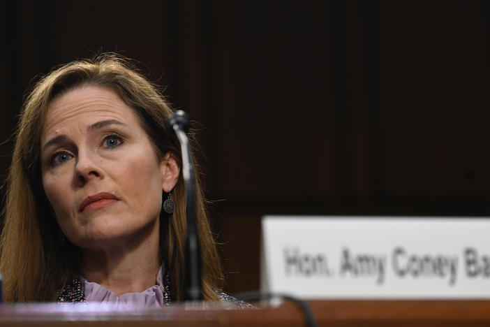 Supreme Court nominee Amy Coney Barrett testifies before the Senate Judiciary Committee on Oct. 14. On Thursday, the committee voted to advance her nomination to the full Senate for a confirmation vote.