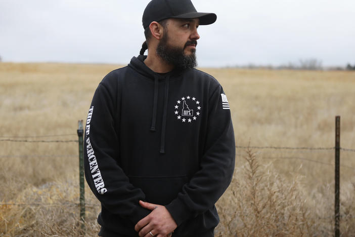 Eric Parker of the Real 3%ers Idaho attends a convoy training exercise in western Idaho on Jan. 25. NPR has followed Parker's political evolution as he joins a wave of "patriot movement" figures seeking – and sometimes winning – public office.