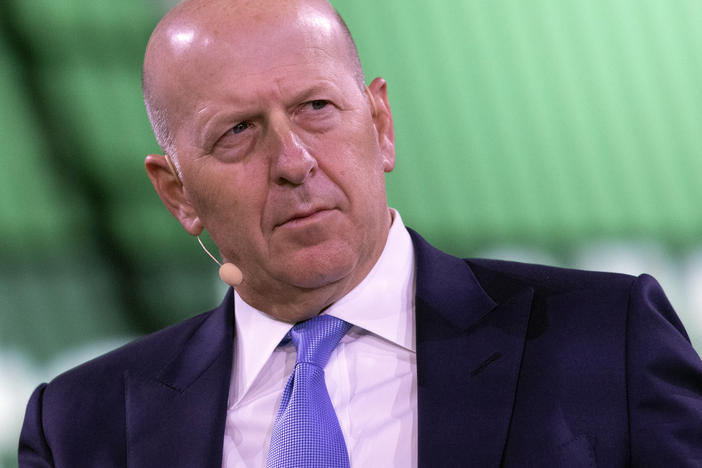 David Solomon, chairman and CEO of Goldman Sachs, shown here at a business roundtable in New York last year, is among several executives at the bank who will have to give back part of their pay.