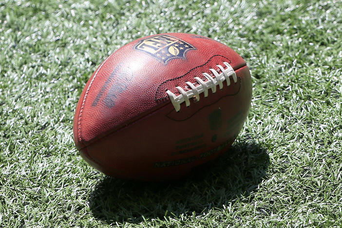 A football lies on the turf prior to the NFL Week 1 game between the Atlanta Falcons and the Seattle Seahawks on September 13, 2020.