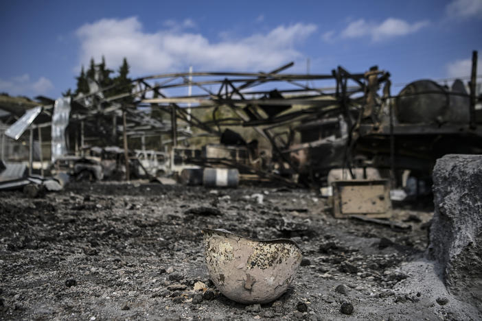 A burned helmet lying on the ground of the hospital in Martakert, a day after shelling during the ongoing fighting between Armenia and Azerbaijan over the disputed region of Nagorno-Karabakh.
