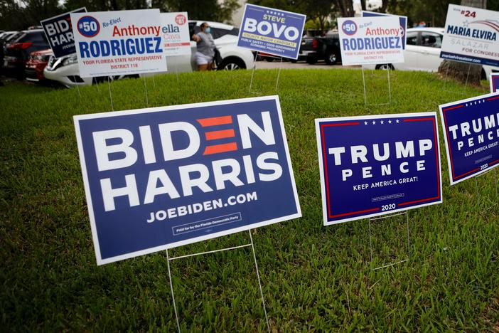 Campaign signs are in abundance last week for early voting at Westchester Regional Library in Miami.