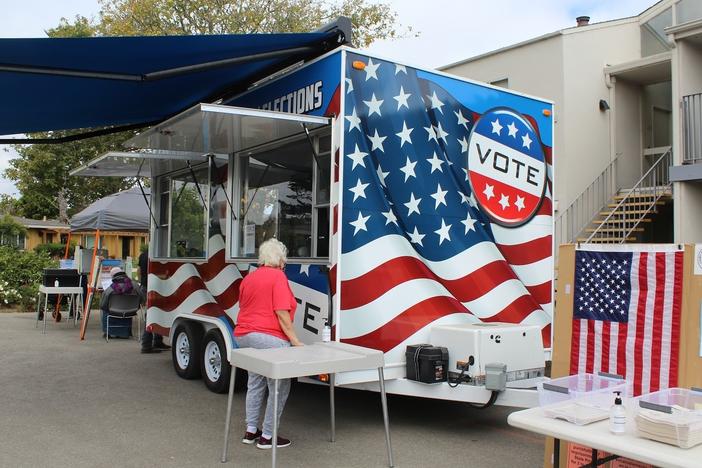 A new mobile voting center brings voting directly to residents in Santa Cruz County, Calif. Here, the VoteMobile is parked at Garfield Park Village, an apartment complex for seniors.