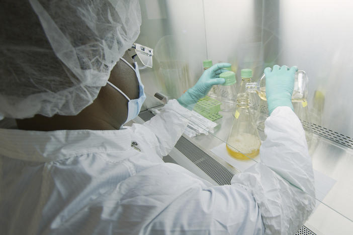 An Eli Lilly researcher tests possible COVID-19 antibodies in a laboratory in Indianapolis.