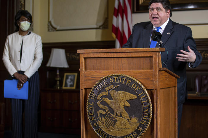 Illinois Gov. JB Pritzker answers questions from the media, along with Dr. Ngozi Ezike, director of the Illinois Department of Public Health, during his daily press briefing on the COVID-19 pandemic on May 22, in Springfield, Ill.