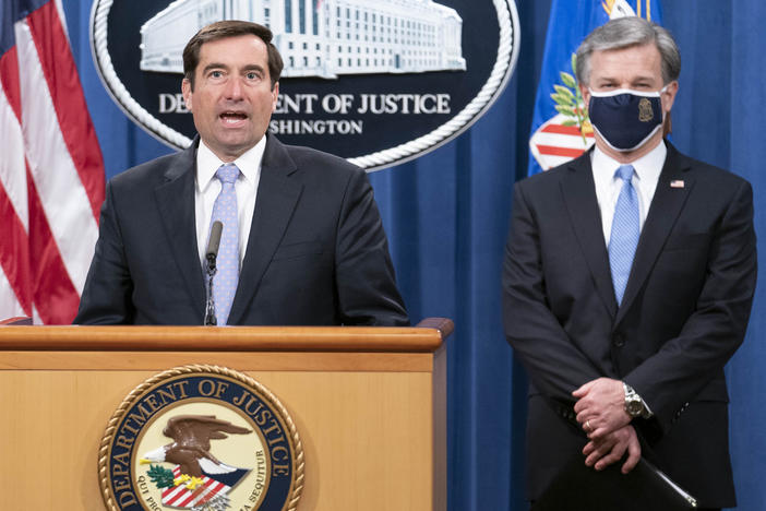 Assistant Attorney General for National Security John Demers speaks during a virtual news conference at the Department of Justice, Wednesday, Oct. 28, 2020 with FBI Director Christopher Wray.