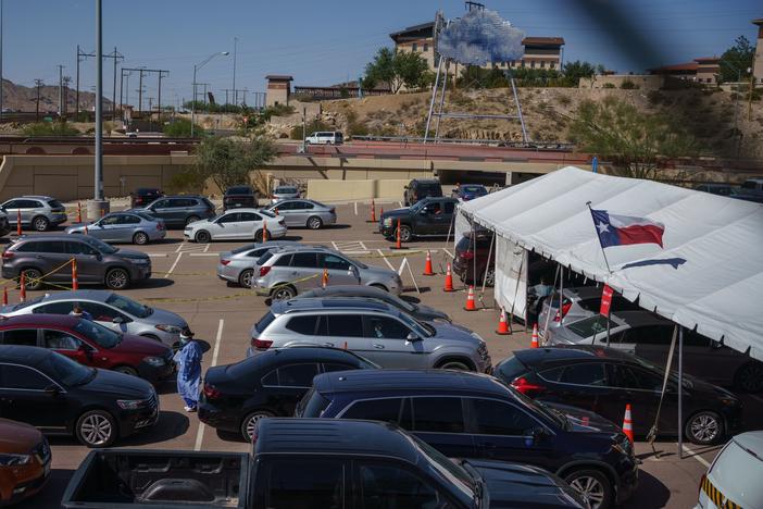 Cars line up for coronavirus tests at the University of Texas at El Paso on Oct. 23. The city has seen a surge in cases, prompting a judge to issue a shutdown of nonessential businesses.