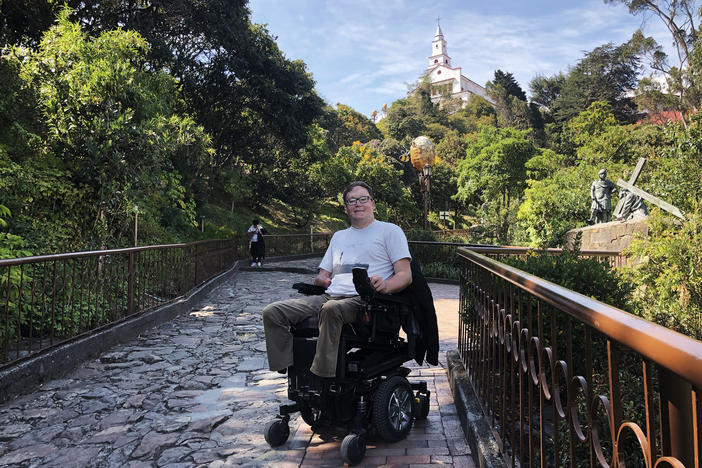 John Morris, here in Bogotá, Colombia, has a website called Wheelchair Travel and hosts a travel podcast.