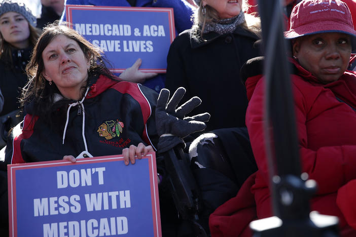 Health care activists rallied in front of the U.S. Capitol on March 22, 2017, to protest Republican efforts that would have dismantled the Affordable Care Act and capped federal payments for Medicaid patients. The Republican congressional bills, part of the party's "repeal and replace" push in 2017, were eventually defeated.