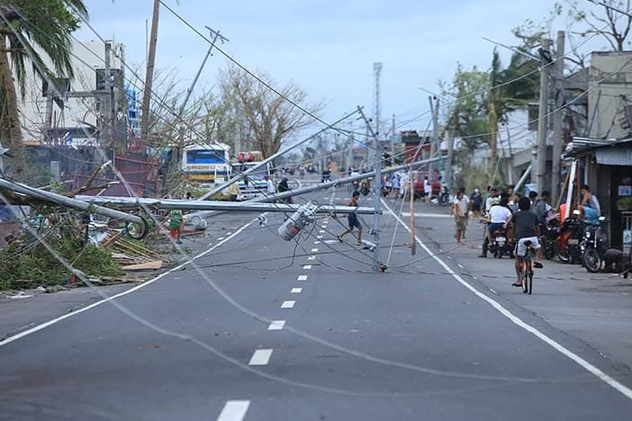 Typhoon Goni downed electric posts in Tabaco, Albay province, in addition to causing deadly flooding and storm surge when it struck the Philippines on Sunday.