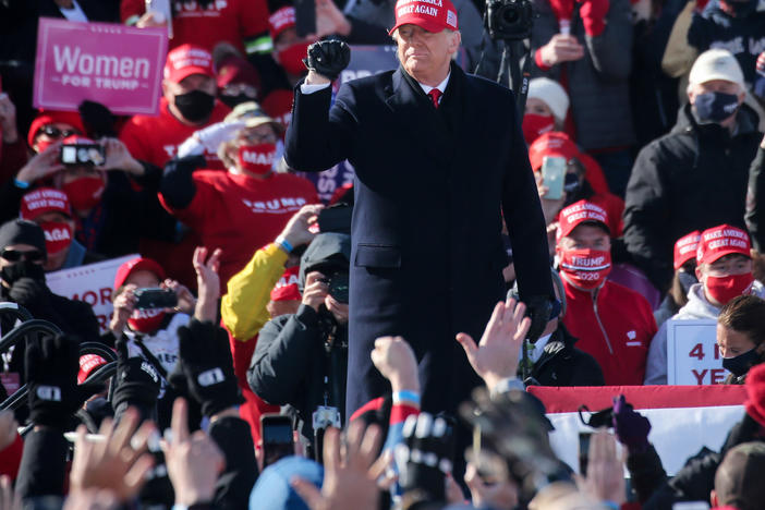 President Trump arrives Sunday for a campaign rally in Dubuque, Iowa. He told supporters that the results of the presidential race should be known on election night.