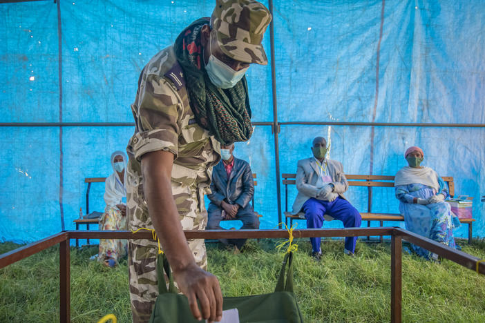 A member of Tigray Special Forces casts his vote in a local election in the regional capital Mekelle, in the Tigray region of Ethiopia in September. The vote defied the federal government and increased tensions in Africa's second most populous country.
