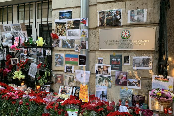 Flowers, stuffed animals and photographs of victims of the renewed fighting over Nagorno-Karabakh have piled up outside the Azerbaijani Embassy in Moscow.