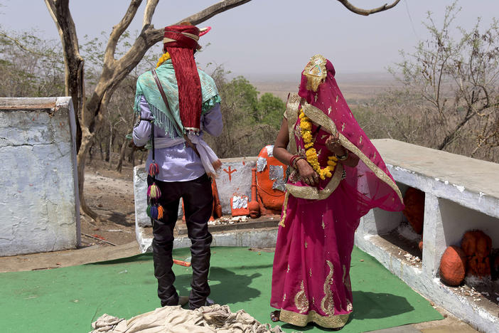 A child bride, age 14, participated in wedding rituals in a Hindu temple in India's Madhya Pradesh state in 2017. An estimated 1.5 million underage girls marry each year in India, according to the United Nations. The pandemic appears to be causing a spike in numbers.
