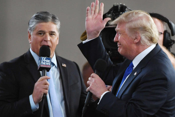 Fox News host Sean Hannity interviews President Trump in Las Vegas in 2018. Hannity, like Trump, has cast doubt on the 2020 election results without providing evidence.