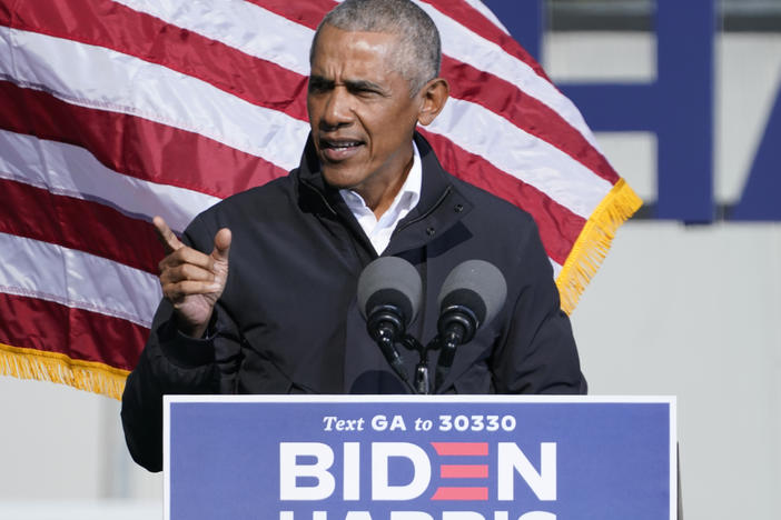 Former President Barack Obama speaks at a rally as he campaigns for Democratic presidential candidate former Vice President Joe Biden, Monday, Nov. 2, 2020, at Turner Field in Atlanta. (AP Photo/Brynn Anderson)