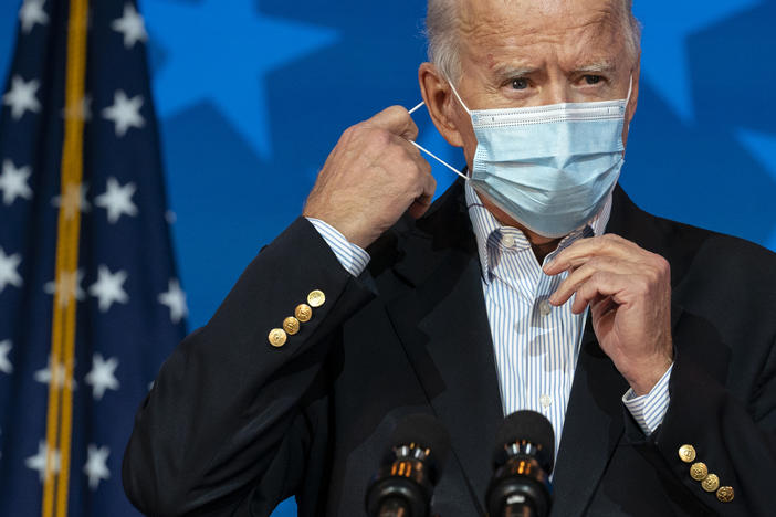 Joe Biden, now the president-elect, removes his face mask Thursday to speak in Wilmington, Del. When he takes office, Biden will be dealing with a virus that is rampaging through the country.