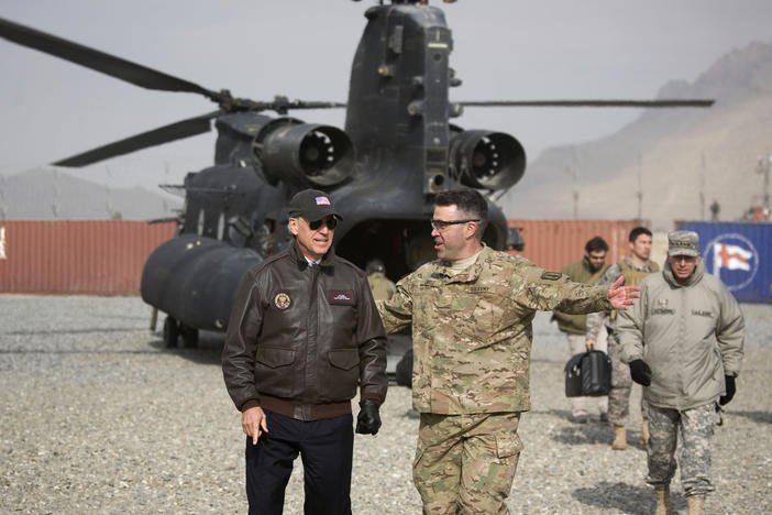 Joe Biden visits U.S. troops in Kabul, Afghanistan, in 2011, when he was vice president. Biden has been highly critical of President Trump's foreign policy and says he'll work to improve frayed relations with many traditional U.S. partners.