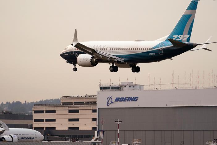 A Boeing 737 MAX jet, piloted by Federal Aviation Administration chief Stephen Dickson, prepares to land at Boeing Field following a test flight late September in Seattle.