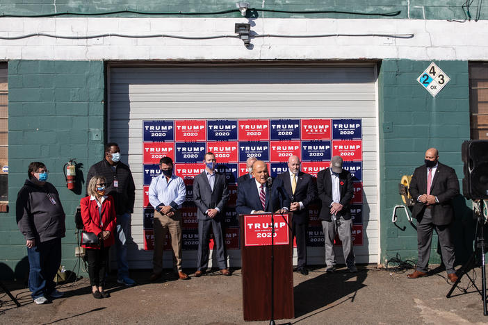 Rudy Giuliani, President Trump's attorney, speaks at a press conference held in the back parking lot of Four Seasons Total Landscaping on Saturday in Philadelphia.
