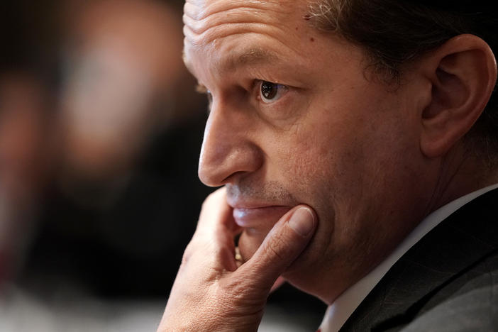 The Justice Department found Thursday that former U.S. Labor Secretary Alexander Acosta, shown here during a 2019 Cabinet meeting at the White House, showed "poor judgment" in the prosecution of Jeffrey Epstein.