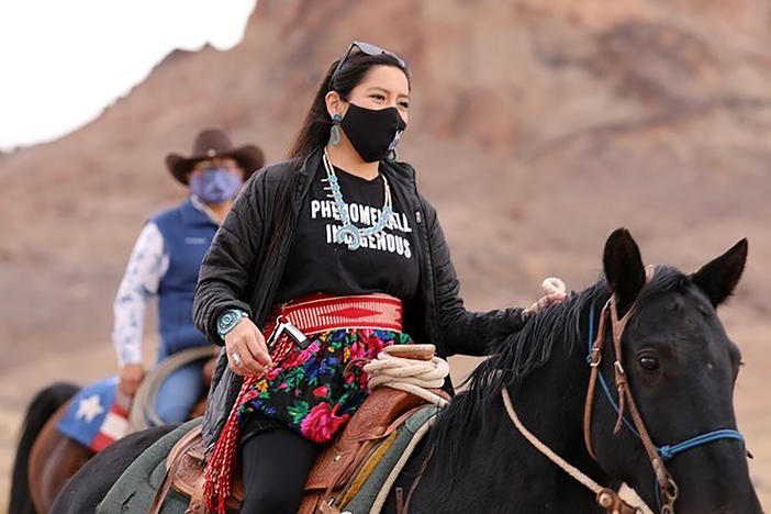 Allie Young, a Diné woman on the Navajo Nation in Arizona, is among a group of Native Americans riding on horseback to the polls on Election Day.