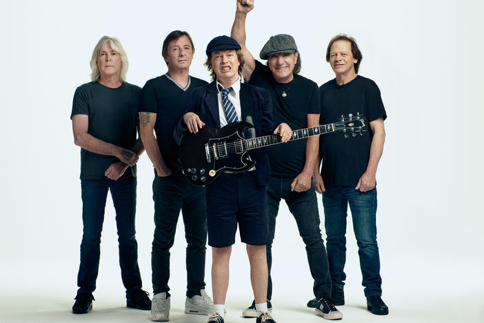 AC/DC, left to right: Cliff Williams, Phil Rudd, Angus Young, Brian Johnson, Stevie Young.