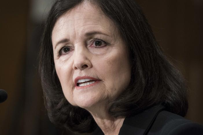 Judy Shelton testifies before the Senate Banking, Housing and Urban Affairs Committee during a February hearing on her nomination to the Federal Reserve's board of governors. A slim majority in the Senate is expected to confirm Shelton this week.