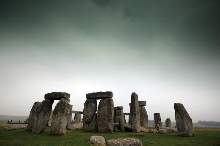 Visitors and tourists walk around the ancient monument at Stonehenge in 2012 in Wiltshire, England.