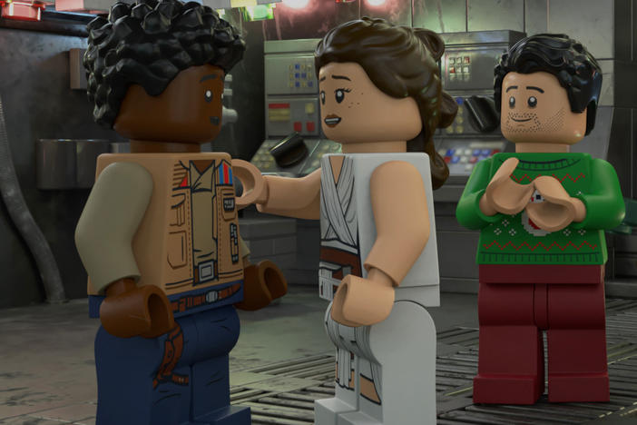 "Now THAT's fan-servicing!': L to R: LEGO Finn, LEGO Rey, LEGO Poe, LEGO Rose and LEGO Chewie plan a Life Day party in <em>The LEGO Star Wars Holiday Special.</em>