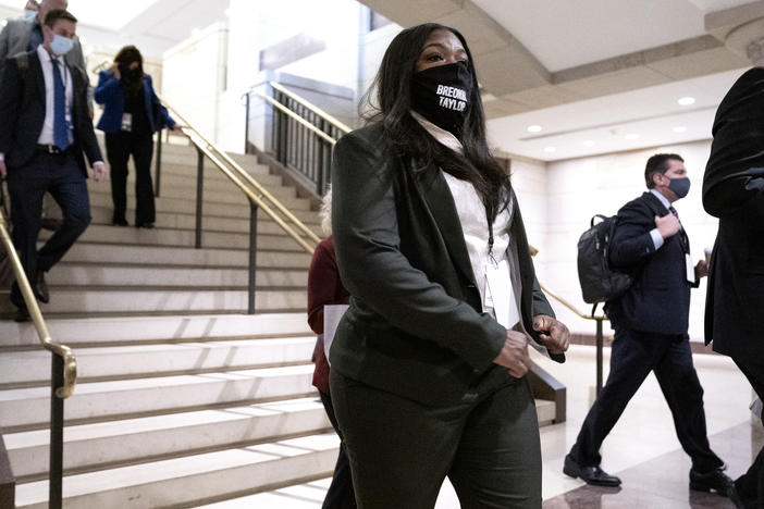 Rep.-elect Cori Bush, a Democrat from Missouri, arrives at a new member briefing at the Capitol on Friday. With the pandemic raging, the orientation bore little resemblance to previous sessions. But lawmakers will have access to coronavirus testing.