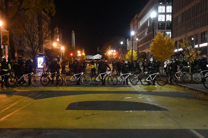 Opposing views clash in Black Lives Matter Plaza after supporters of Trump held a rally.