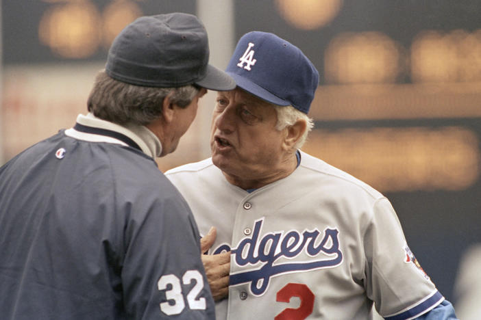 LA Dodgers manager Tommy Lasorda argues a call with an umpire during a game against the New York Mets in 1992. During his two decades as manager, Lasorda led Los Angeles to two World Series championships.
