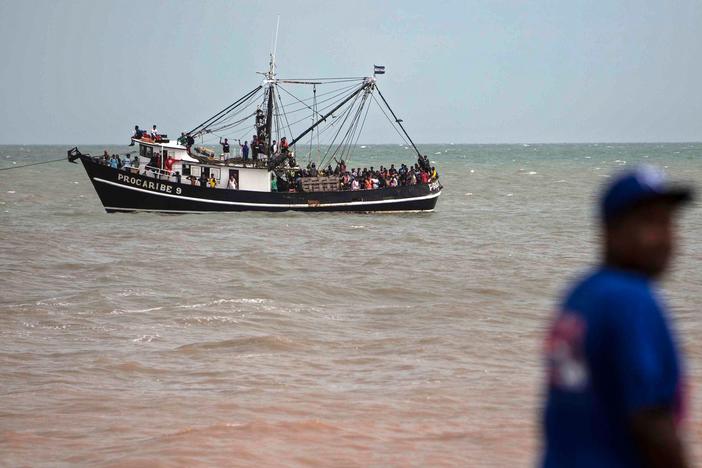 Navy members help evacuate people on a boat from the Karata and Wawa Bar communities ahead of the arrival of Hurricane Iota in Bilwi, Puerto Cabezas, Nicaragua, on Sunday.