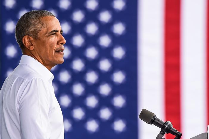 Former President Barack Obama speaks at a Biden-Harris drive-in rally in Miami on Oct. 24. In his first interview with Terry Gross, Obama talks about what he misses most about being president and reflects on the turmoil of the Trump White House. Obama's new memoir is <em>A Promised Land.</em>