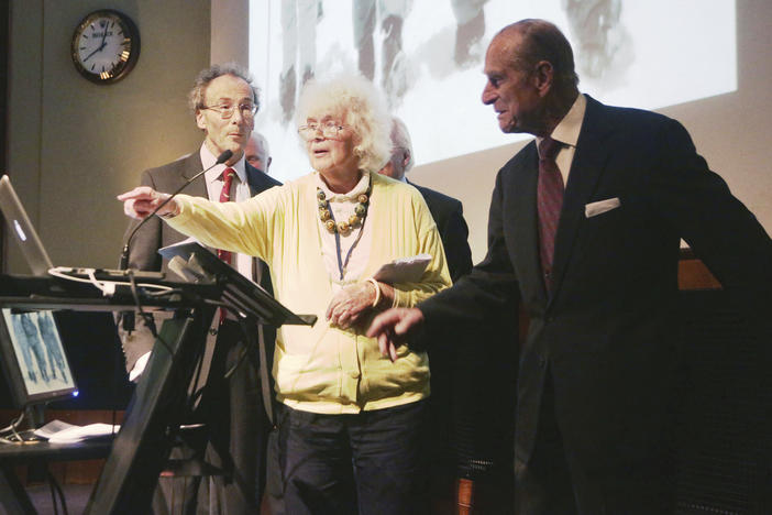 In this May 29, 2013 file photo, travel writer, journalist and author, Jan Morris, center, with the Duke of Edinburgh, right, during a reception to celebrate the 60th Anniversary of the ascent of Everest, at the Royal Geographical Society in London.