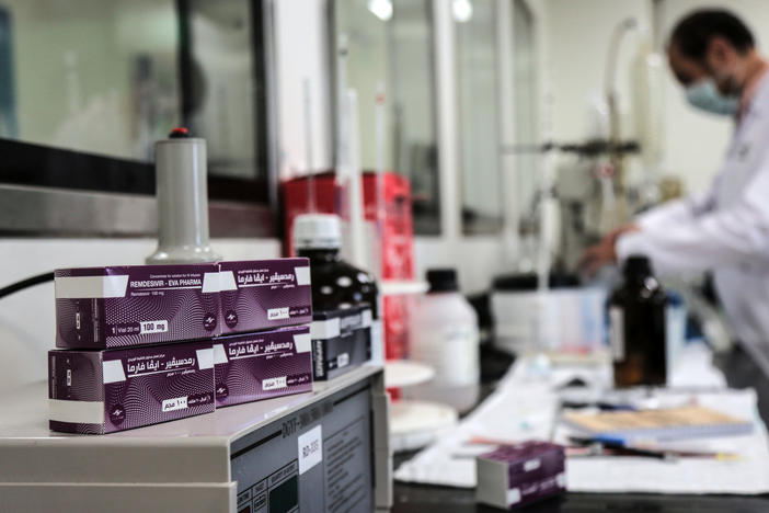 Boxes containing vials of remdesivir at a pharmaceutical company in Giza, Egypt.