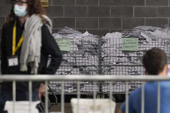 Election office workers process ballots at the Allegheny County elections returns warehouse in Pittsburgh, earlier this month.