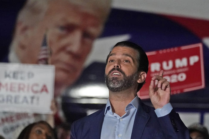 In this Nov. 5 photo, Donald Trump Jr. gestures during a news conference at Georgia Republican Party headquarters in Atlanta. Trump Jr. has been infected with the coronavirus but says he is currently asymptomatic.