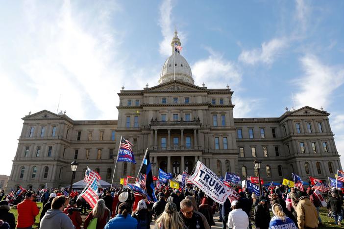 Protesters gather in support of President Trump on Nov. 14 at the Michigan Capitol in Lansing. Trump and his allies have baselessly alleged widespread voter fraud was to blame for the president's election loss.