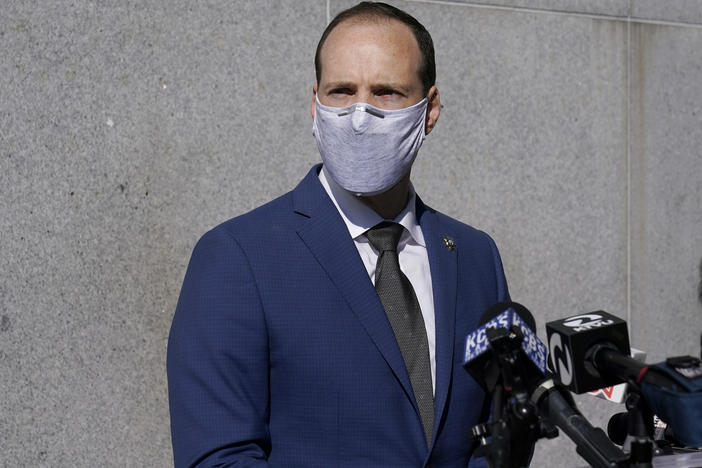 San Francisco District Attorney Chesa Boudin speaks at a news conference in San Francisco on Monday. A former San Francisco police officer, Chris Samayoa, who fatally shot an unarmed carjacking suspect in 2017, is facing numerous charges including voluntary manslaughter.